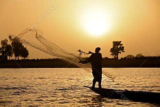 Fisherman at sunset