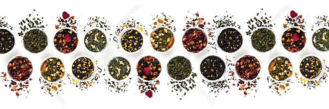 Assortment of dry tea bowls in a row isolated on white background. Panoramic banner. Flat lay top view concept