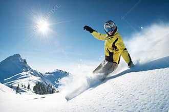 Snowboarder in high mountain