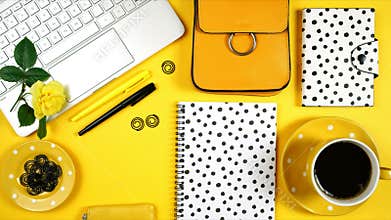 Desktop workspace with hi-tech laptop and modern colorful accessories.