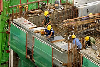 Construction workers at high-r