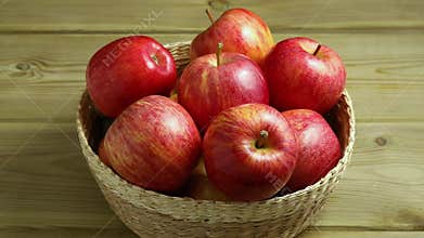 Basket with fresh picked homegrown colorful apples