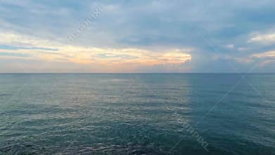 Deep blue sea water and dark calm ocean wave crashing tropical summer seashore