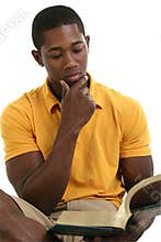 Attractive Young Man Reading Book