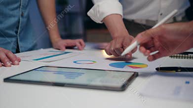 Millennial Asia businessmen and businesswomen meeting brainstorming ideas about new paperwork project colleagues working together