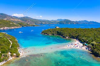 Aerial view of iconic paradise sandy beaches with turquoise sea in complex islands of Agios Nikolaos and Mourtos in Sivota.