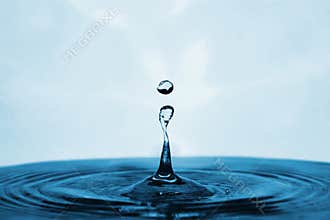 Blue Water Drop Landing in a Pool