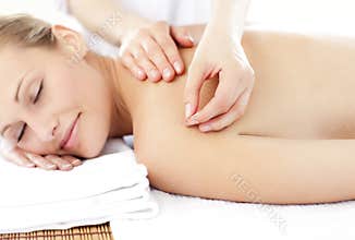 Asleep woman receiving an acupuncture treatment