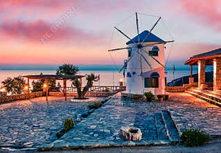 Fabulous morning scene on the Windmill. Colorful spring sunrise on the Zakynthos island, Korithi location, Ionian Sea, Greece,