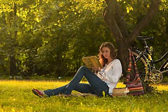Girl reading in park
