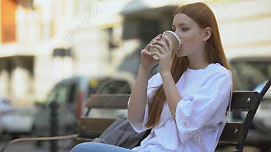 Girl drinking coffee feeling bad taste of cheap coffee beans, bad quality