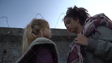 Poor children of war taking bag, going to escape from warring country, poverty