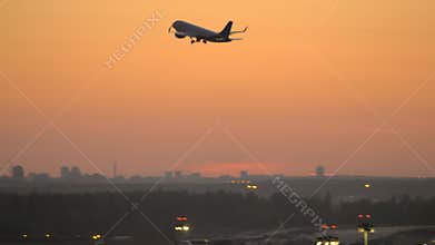 Airplane take-off in the evening