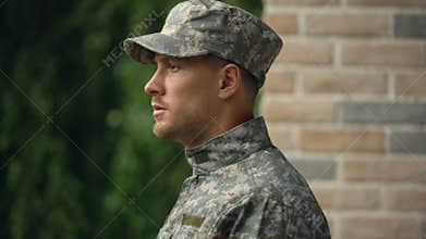 Upset soldier remembering military service, social program to support veterans