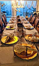 Festive Christmas table with golden plates