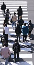 Group of people crossing the street