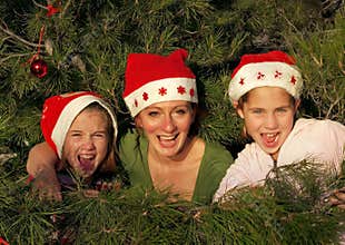 Human decoration on christmass tree
