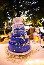 Blue wedding cake with baby`s breath