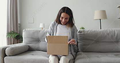 Smiling female customer satisfied with delivery service.