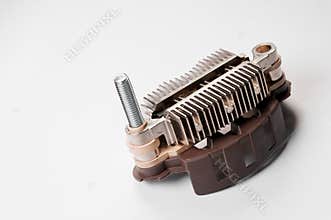 Close-up of a new relay regulator equalizing the voltage in the generator. New auto parts