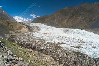 Passu glacier in summer season surrounded by Karakoram mountain range, Gilgit Baltistan, Pakistan