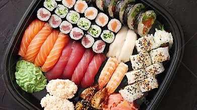 Various kinds of sushi on plate or platter set