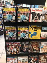 Magazine newsstand display featuring coronavirus magazine