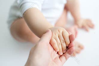 A Mother\'s Hand Holding Her Baby\'s Hand: A Bond of Love Emotional Connection Protection
