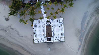 Beach wedding zenital drone video, outdoor day wedding at the beach