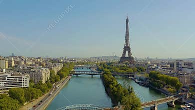 PARIS, FRANCE - MAY, 2019: Aerial drone view of historical city centre with Eiffel tower and Seine river.