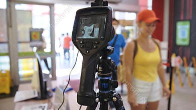 Temperature check at a supermarket, grocery store with a thermal imaging camera installed. Coronavirus pandemic outbreak