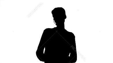 Silhouette Call center woman with headset posing to camera.