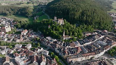 Aerial Drone shot of Brunico or Bruneck, a small town in South Tyrol. Evening time in Italian Alps Alto Adige