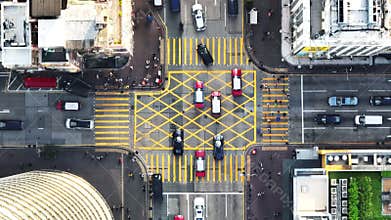 Car traffic transport on road, pedestrian people walk cross zebra crossing, crossroad junction in Hong Kong