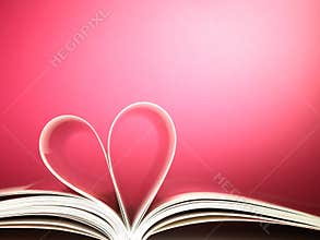 Pages of a book curved into a heart shape