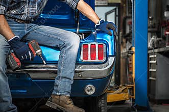 Classic Cars Restoration Hobbyist and His Current Vehicle Project