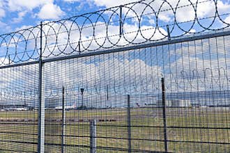 Barbed wire on a fence at London Heathrow Airport