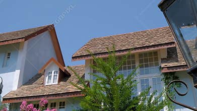 Exterior Modern Townhouse Apartment Retro Style Tiled Roof Blue Walls Old Lamp
