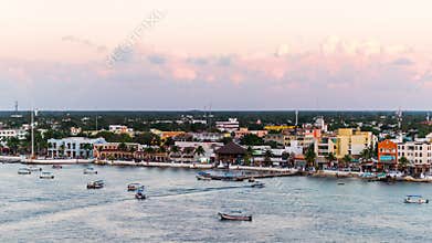 Cozumel, Mexico coastal town skyline at dusk