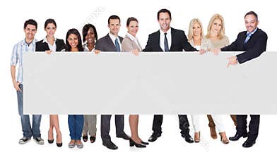 Group of business people presenting empty banner