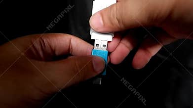 Plug the flash disk into OTG (On The Go) type C.