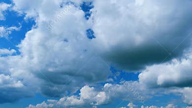 Beautiful Blue Sky With Clouds. Beautiful White Cumulus Clouds In Blue Sky With Sunlight. Zoom In.