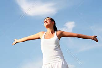 Woman with arms outstretched