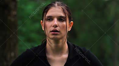 Face, sweat and fitness with a sports woman breathing while feeling tired after an exercise or workout. Exhausted