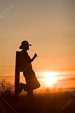 Cowboy Watching Sunset