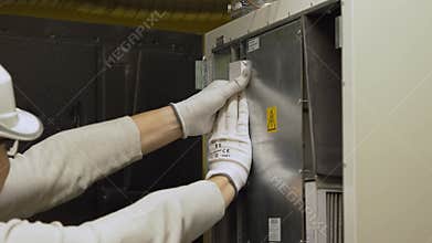 Replacing filter in the central ventilation system. hvac filter replacing home central air system