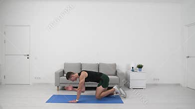 sport balance training of man athlete at home. man athlete training balance sport. sport man athlete