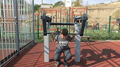 Children on the playground on the street in the yard. Live a healthy life. Be H3althy
