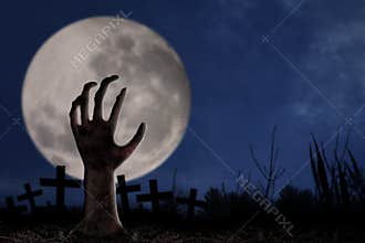 Zombie hand on graveyard