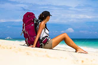 Backpacker on beach